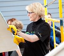 Carlson CEO Trudy Rautio volunteering with Twin Cities Habitat for Humanity