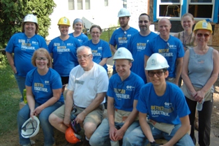 Blue Cross & Blue Shield volunteers help sheetrock St. Paul rehab