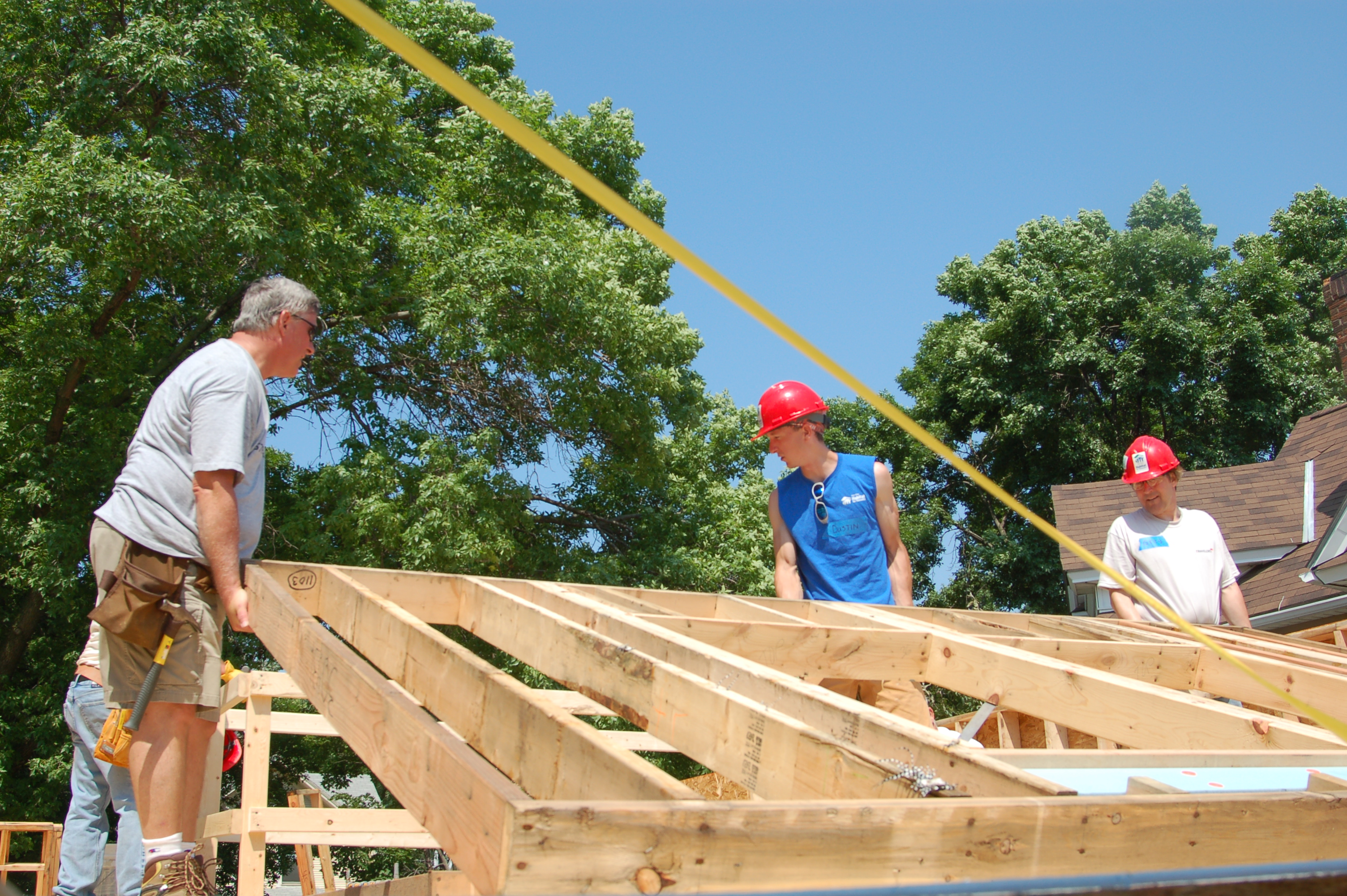 Travelers framing second floor of St. Paul Habitat home