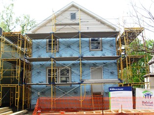 Holy Hammers completing exterior work on Frogtown build