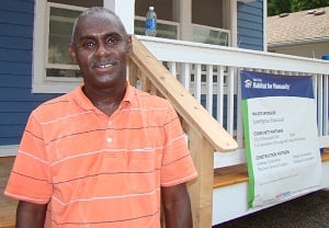 Ameriprise and Habitat homebuyers working together in N. Mpls.