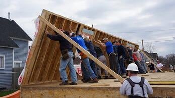 Habitat volunteers help build safe, decent affordable homes