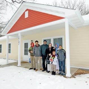 Two North Metro Homes Dedicated