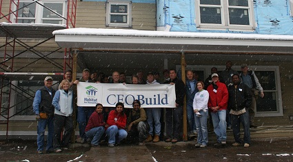 CEOs building with Twin Cities Habitat