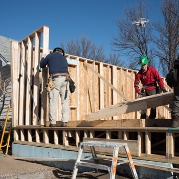 Volunteers Encounter a Drone on Habitat Build Site