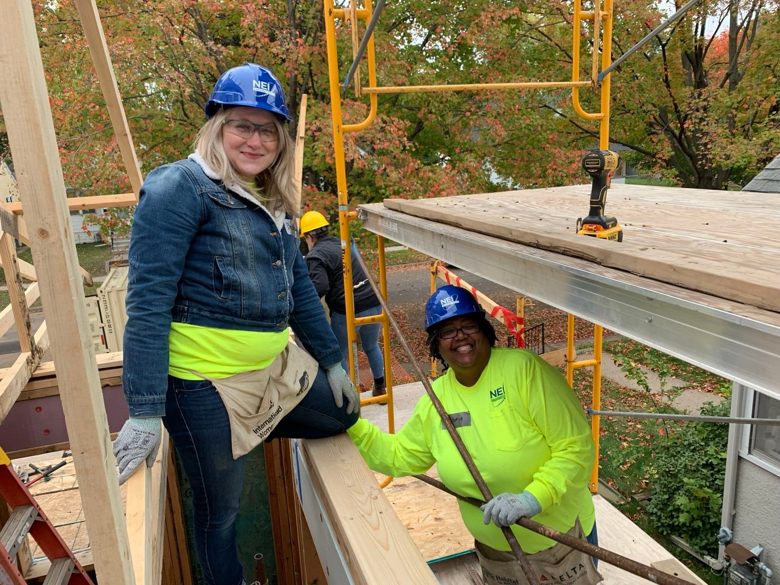 women build construction hard hats