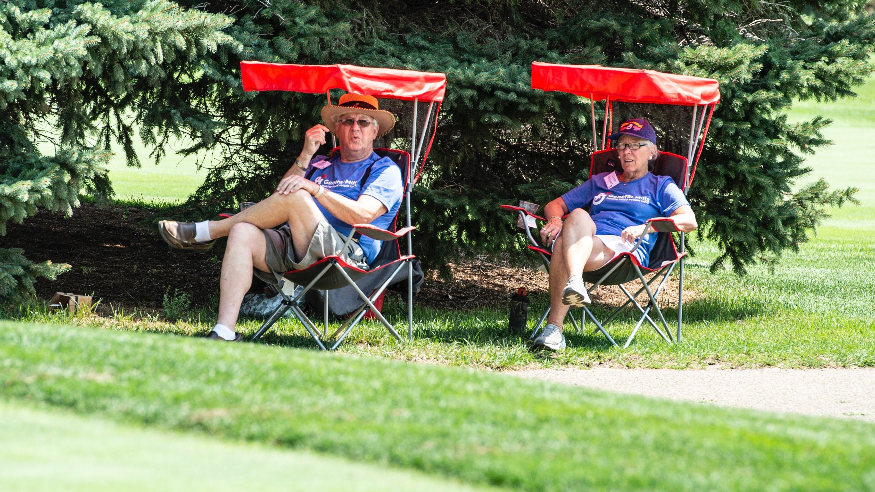 Rich and Linda Johnson volunteering at a hole during the Raise the Roof event