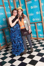 Kaitlyn and a friend at the 2019 HHBT Gala, wearing outfits made of construction items..