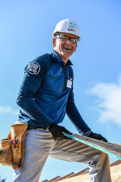 Barry Mason working on a roof.