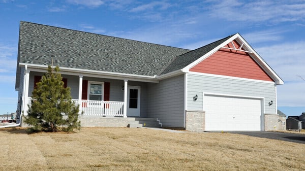 A gray and red house.