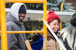 Two AmeriCorps members laughing.