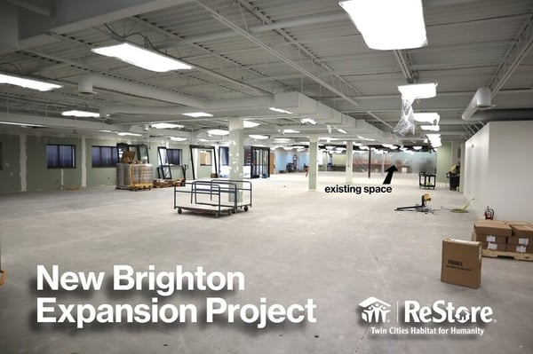 The interior of the New Brighton location under construction. White text says "New Brighton Expansion Project" with the ReStore logo at the bottom right.