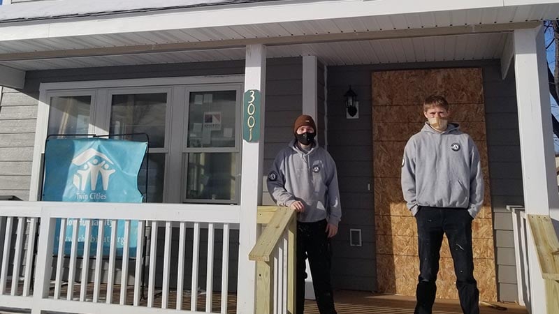 Chase and Lane on the porch of James Ave N