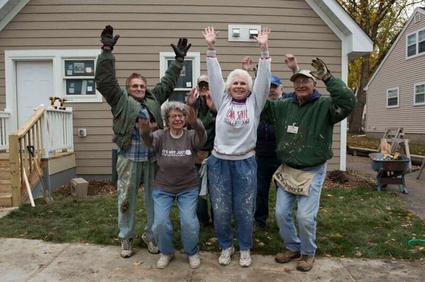 The JCRC Reg Crew with their hands in the air.