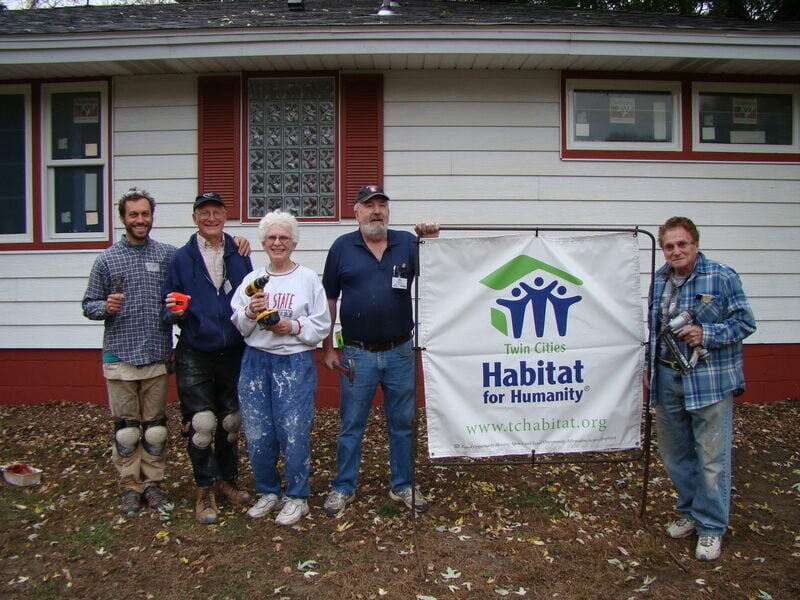 The JCRC Reg Crew with a Habitat for Humanity sign.