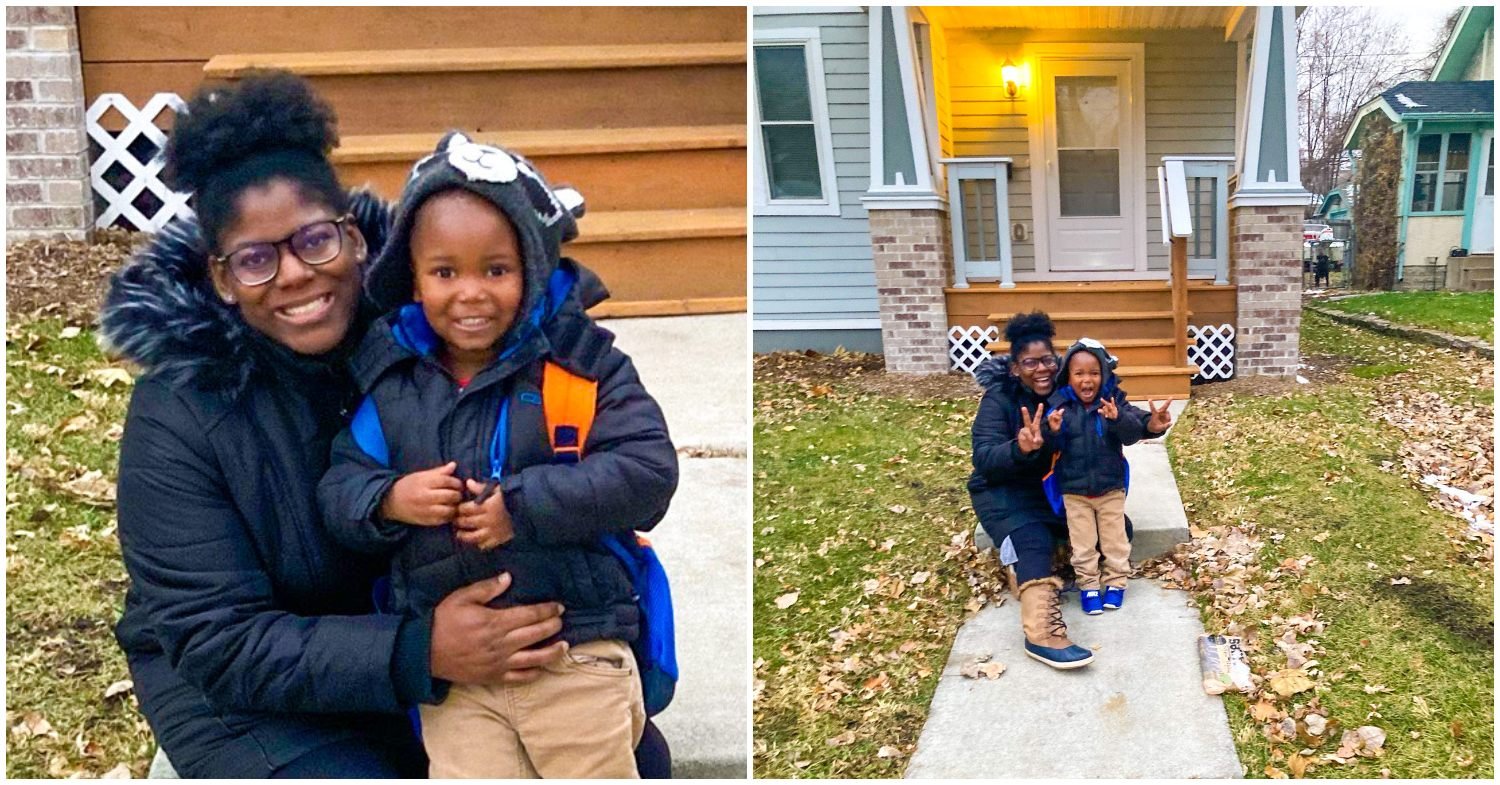 Habitat homeowner Julia with her son outside of their new home