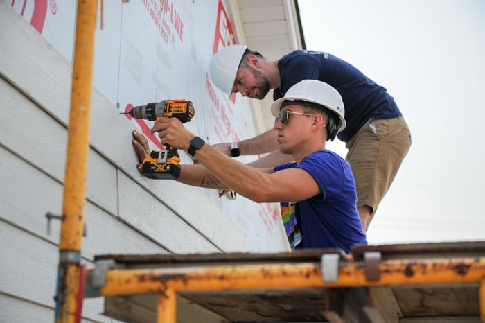 Rainbow Build 2021 installing siding