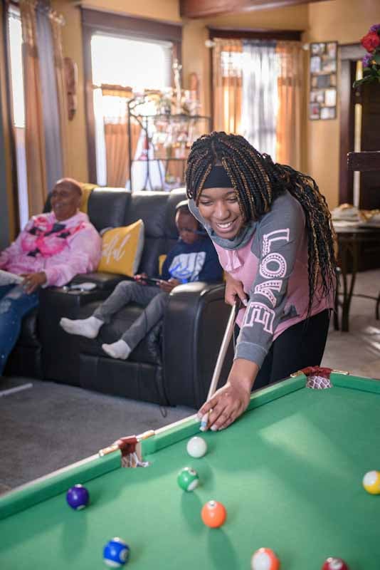 Sienna playing pool