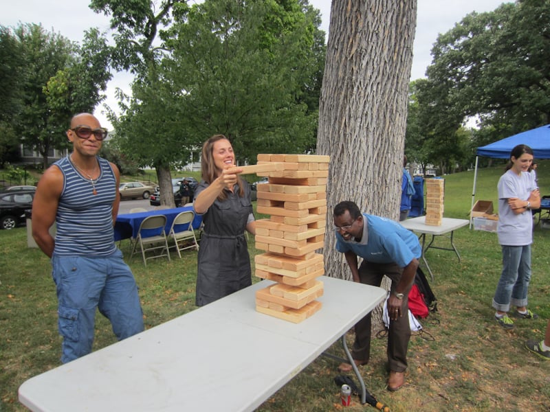 Hassan playing giant Jenga