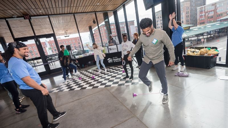 Guests playing skip-it on the dance floor.
