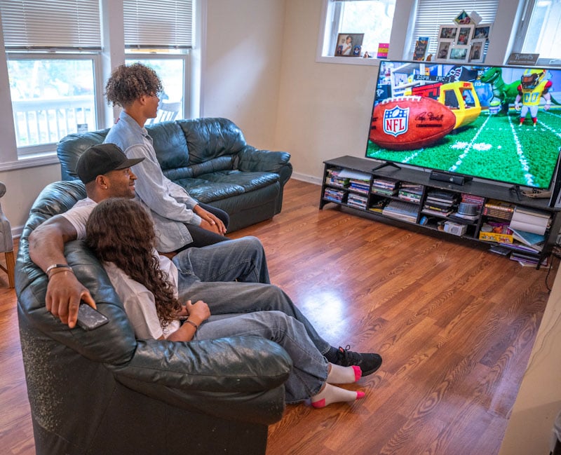 James Hargon family watching TV