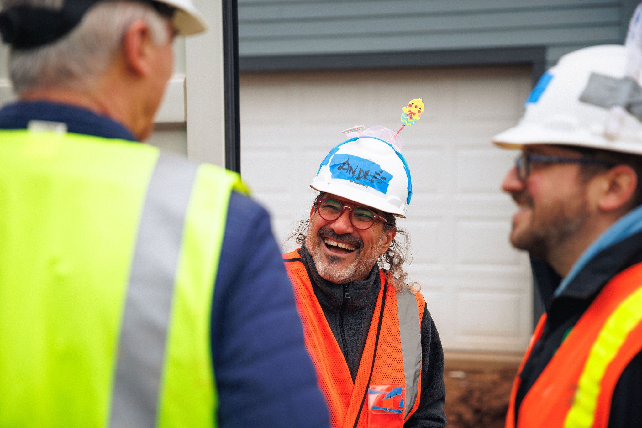 Julie Loomis birthday build volunteer laughing
