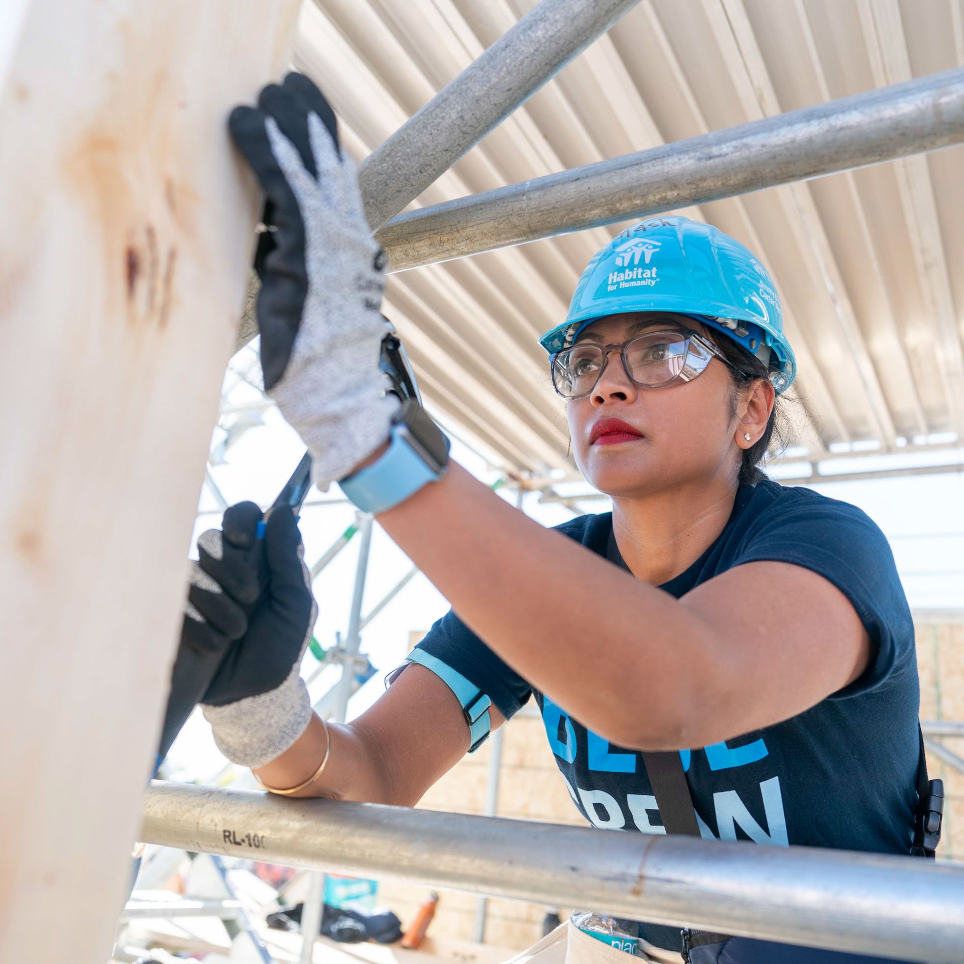 CWP volunteer hammering