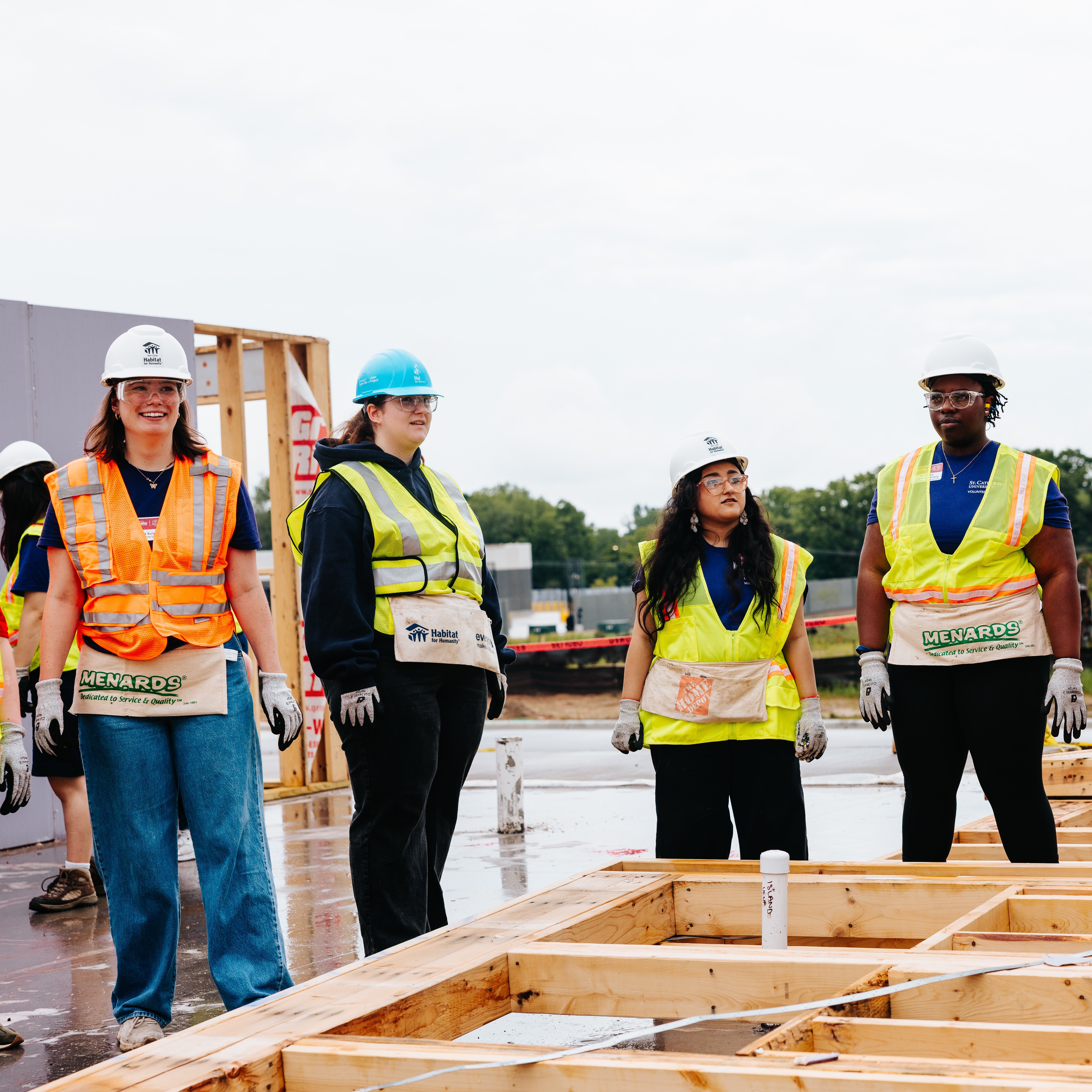 Volunteers standing in a group.