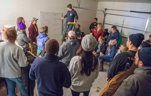 Site Supervisor Jake gives the safety talk and goes over the day's projects with staff.