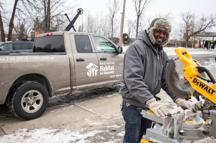 Americorps member working outside