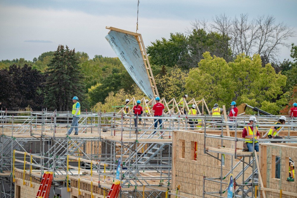 Volunteers on scaffolding