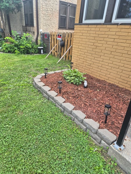 New mulch and concrete edging.