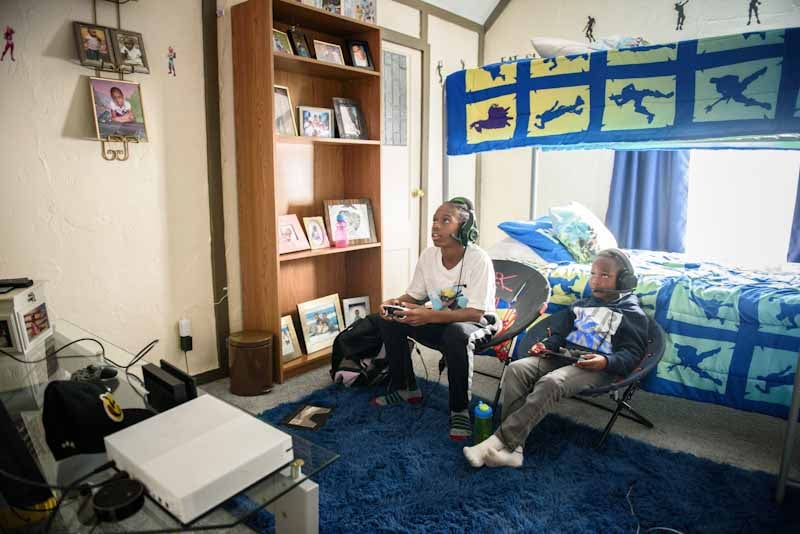 Deborahs grandsons playing video games