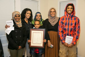 Sadia and Asha with their family.