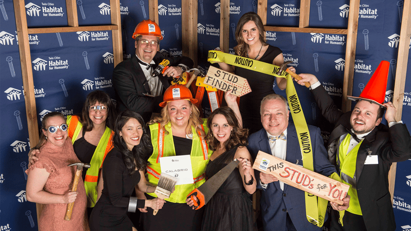 Hard Hat & Black Tie Partygoers