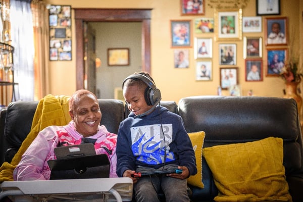 Habitat homeowner and her grandchild.