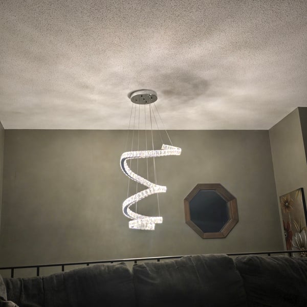 Dramatic swirly light fixture.