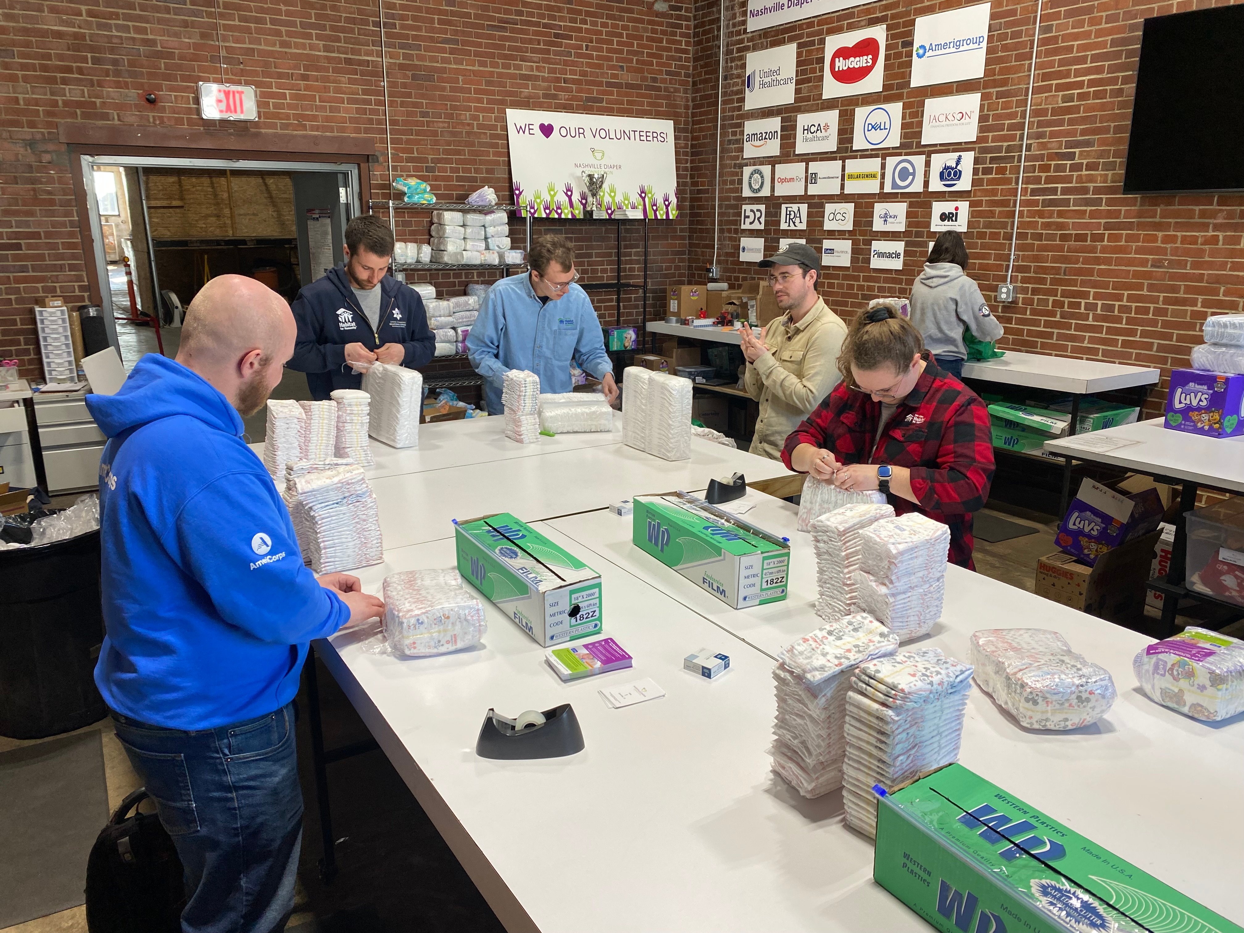 Nashville Diaper Connection, Members packing diapers
