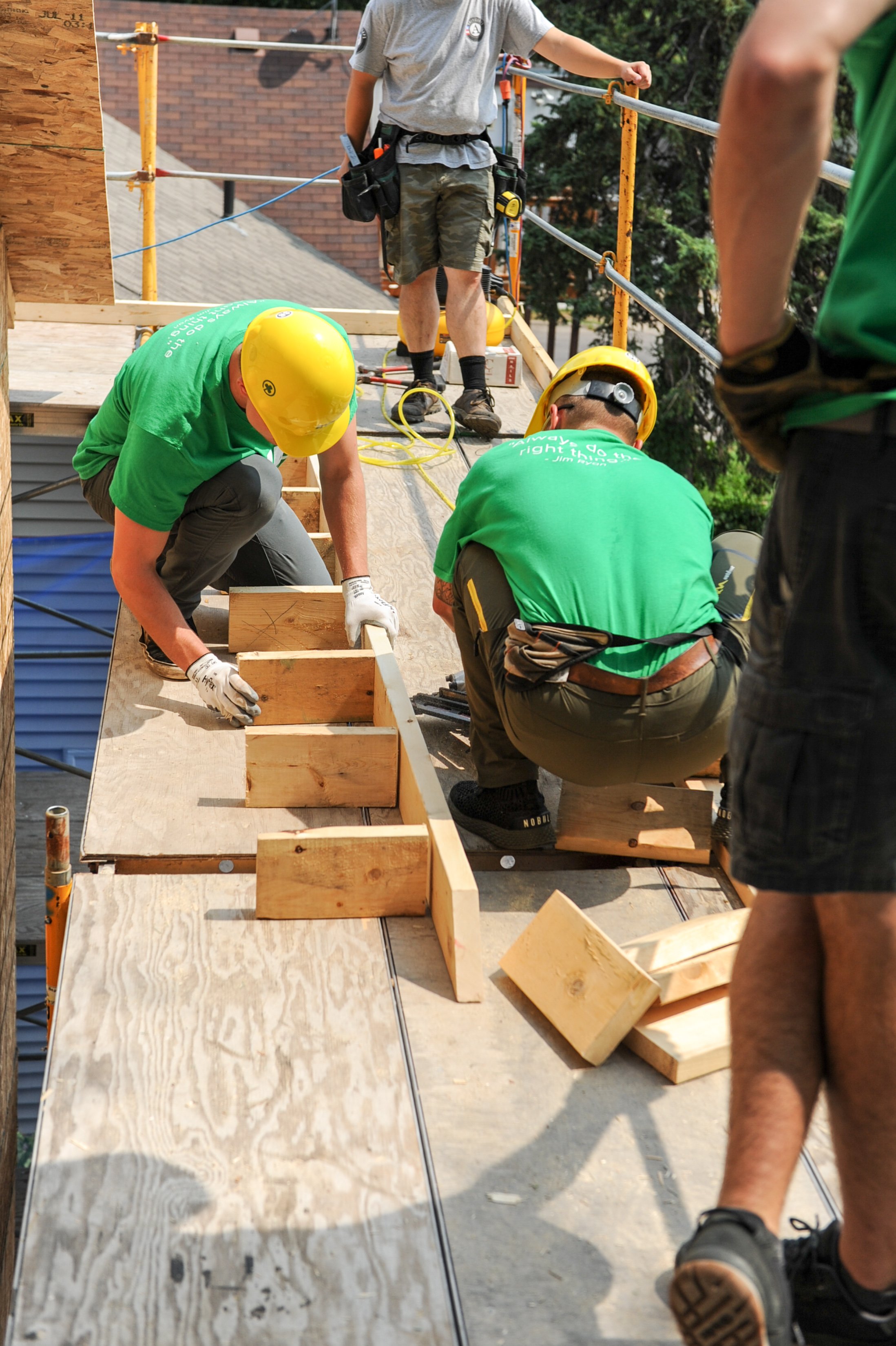 volunteers building