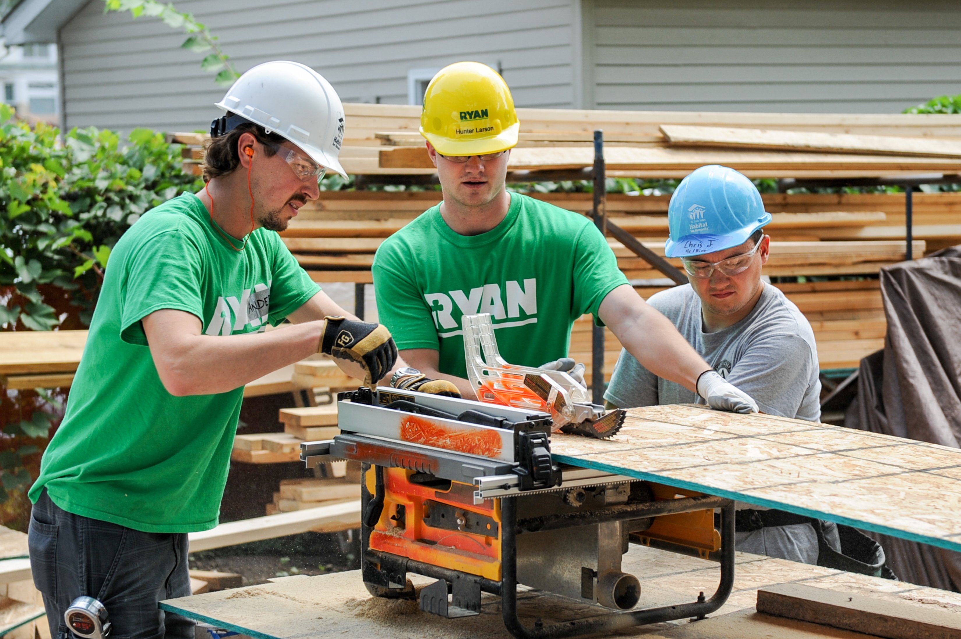 volunteers using tools