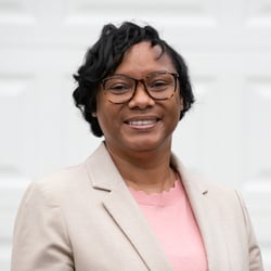 Shereese Turner in a pink blouse and tan jacket.