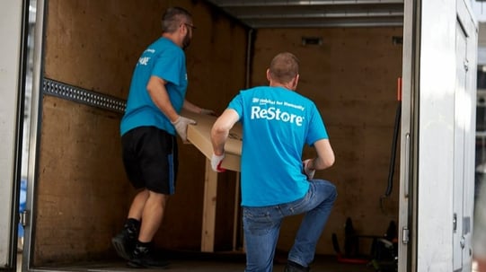ReStore volunteers loading a truck.