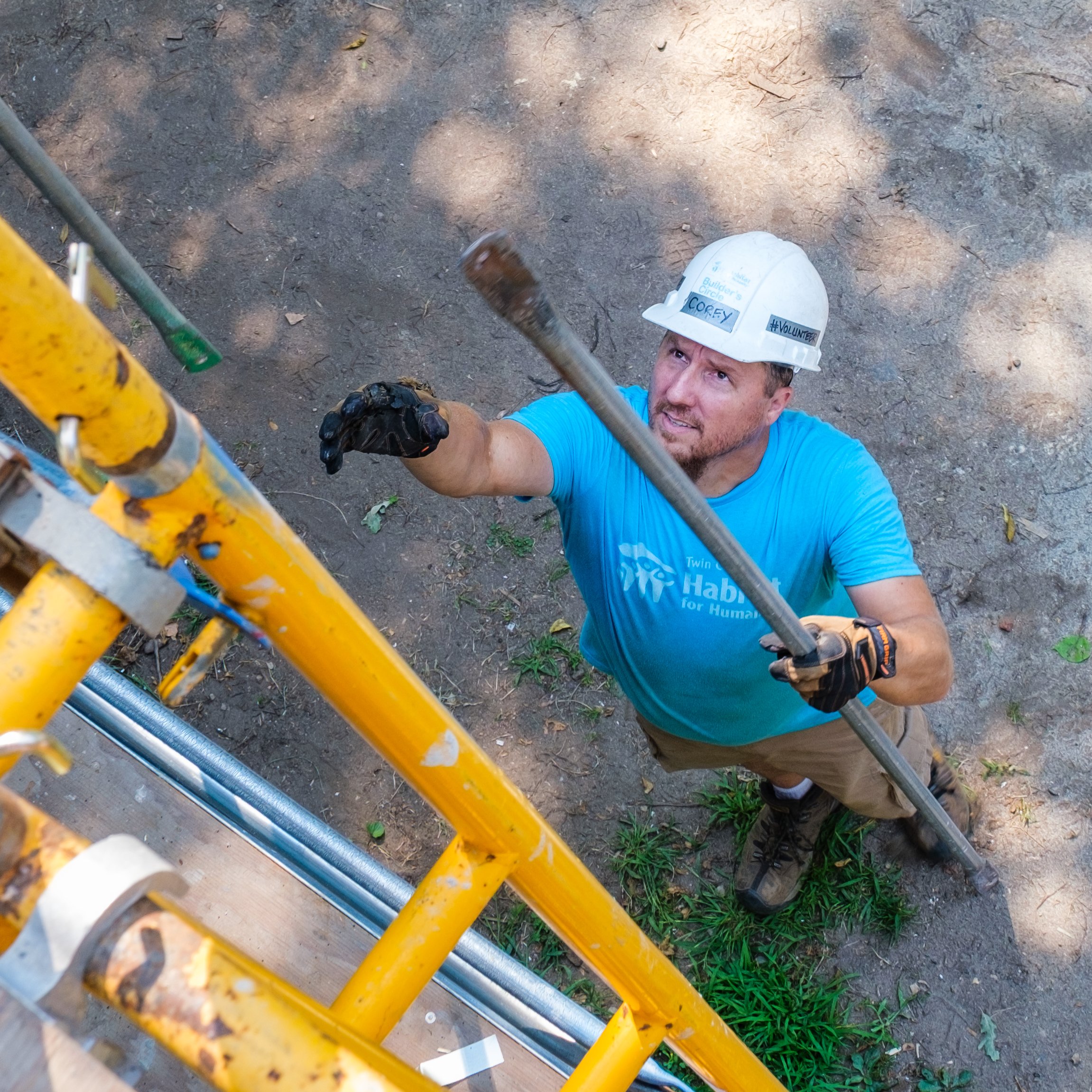 man working near scaffolding