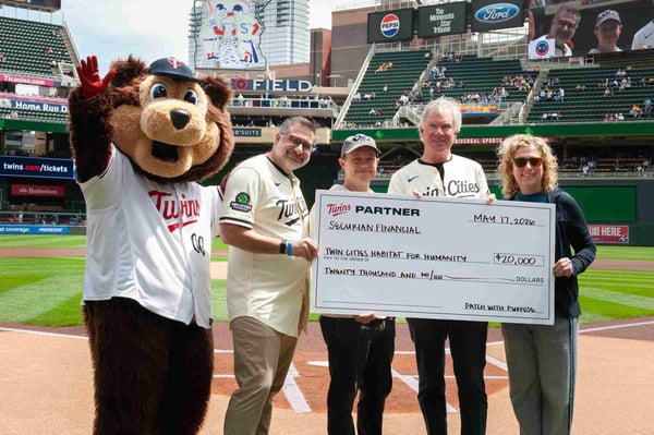 Twins game check presentation at home plate.
