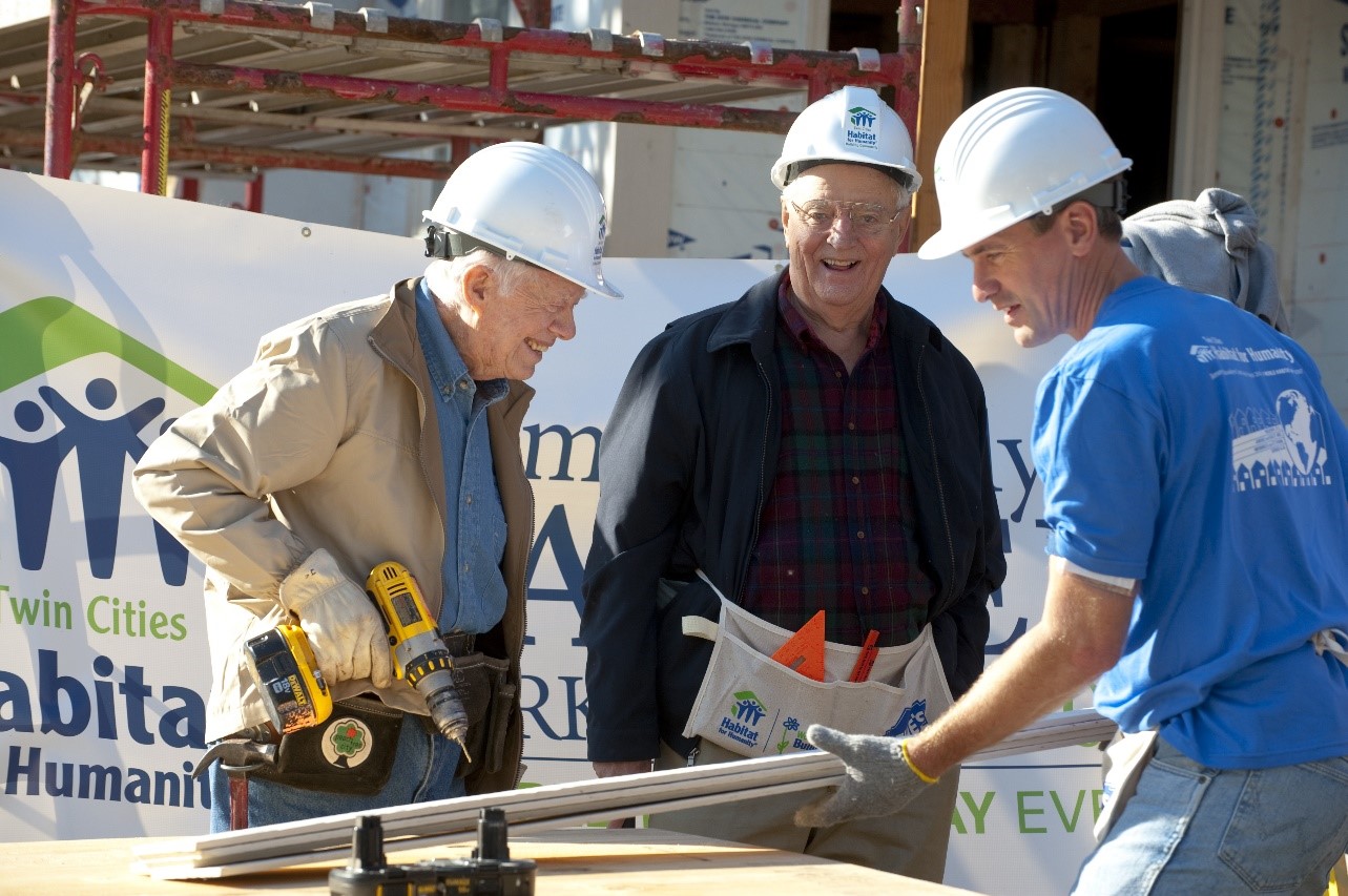 Walter Mondale helps build with Jimmy Carter and R.T. Rybak during the Carter Build in Minneapolis in 2010.