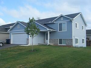 A blue Habitat home.