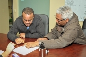 A homebuyer signing closing documents.