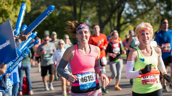 Smiling runners.
