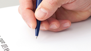 Someone writing a will.
