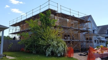 women_build_house_side_photo